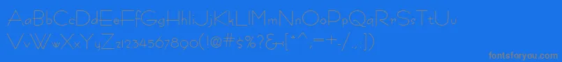 フォントFastracfashionRegular – 青い背景に灰色の文字