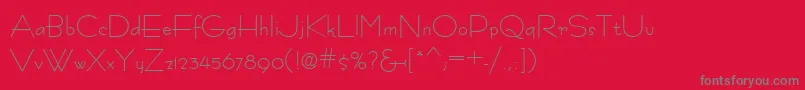 フォントFastracfashionRegular – 赤い背景に灰色の文字