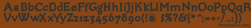 Bloxxserifbold Font – Black Fonts on Brown Background