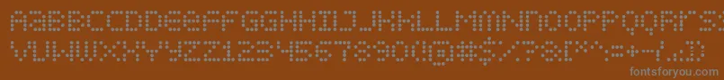 Displdts Font – Gray Fonts on Brown Background