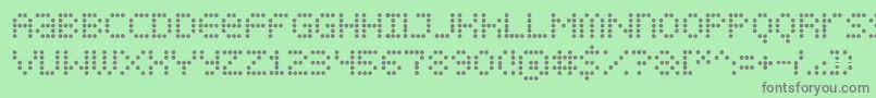 フォントDispldts – 緑の背景に灰色の文字