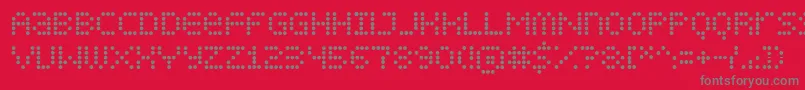 フォントDispldts – 赤い背景に灰色の文字