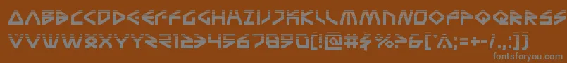 Terrafirmahalf-fontti – harmaat kirjasimet ruskealla taustalla
