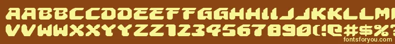 AstropolisExpanded-fontti – keltaiset fontit ruskealla taustalla