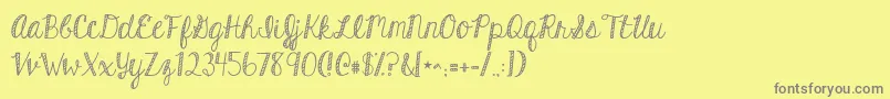 Kghardcandystriped-Schriftart – Graue Schriften auf gelbem Hintergrund