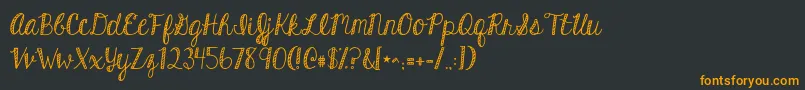 Kghardcandystriped Font – Orange Fonts on Black Background