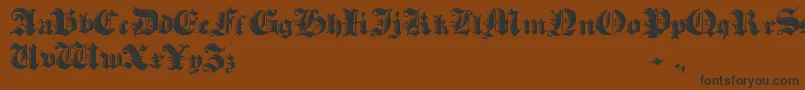 HeavyGothik-Schriftart – Schwarze Schriften auf braunem Hintergrund