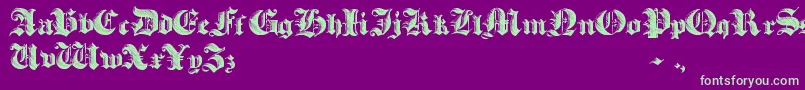 HeavyGothik-Schriftart – Grüne Schriften auf violettem Hintergrund