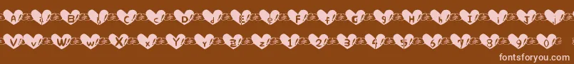 Heartfont Font – Pink Fonts on Brown Background