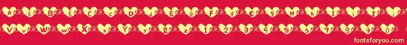 Fonte Heartfont – fontes amarelas em um fundo vermelho