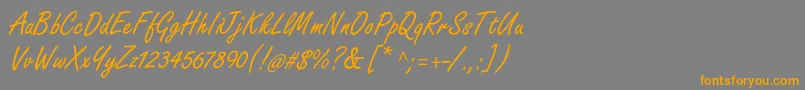 フォントFreestylescriptstd – オレンジの文字は灰色の背景にあります。