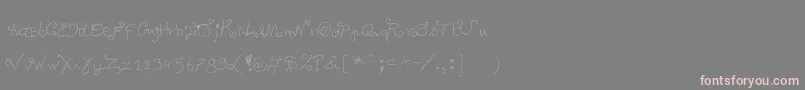 フォントDegueulasse – 灰色の背景にピンクのフォント