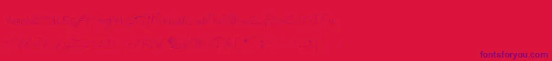 Czcionka Degueulasse – fioletowe czcionki na czerwonym tle