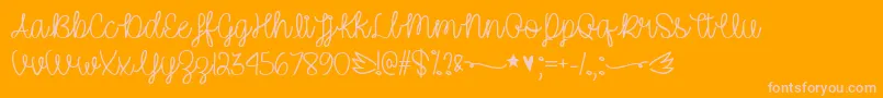 UnicornSparklesTtf-Schriftart – Rosa Schriften auf orangefarbenem Hintergrund