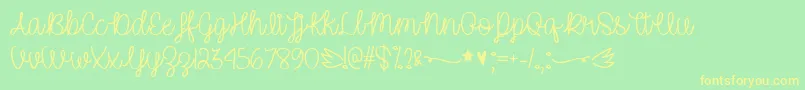 UnicornSparklesTtf Font – Yellow Fonts on Green Background