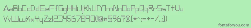 フォントAndromedatv – 緑の背景に灰色の文字