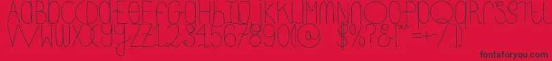 DhdskinnyRegular Font – Black Fonts on Red Background