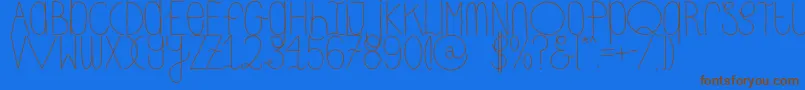 DhdskinnyRegular-Schriftart – Braune Schriften auf blauem Hintergrund