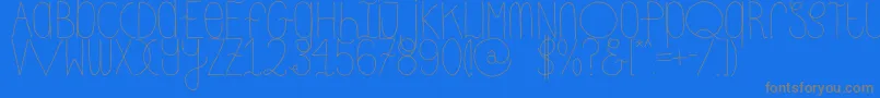 DhdskinnyRegular-Schriftart – Graue Schriften auf blauem Hintergrund