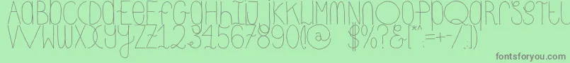 DhdskinnyRegular Font – Gray Fonts on Green Background