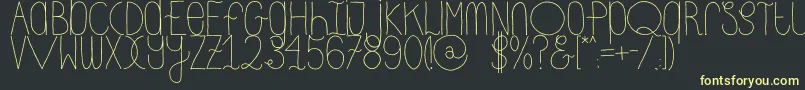 DhdskinnyRegular Font – Yellow Fonts on Black Background