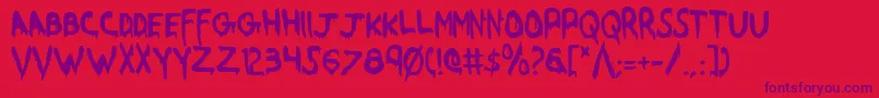 Czcionka WereBeastCondensed – fioletowe czcionki na czerwonym tle