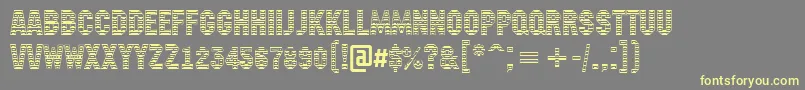 フォントAMachinanovastdc – 黄色のフォント、灰色の背景