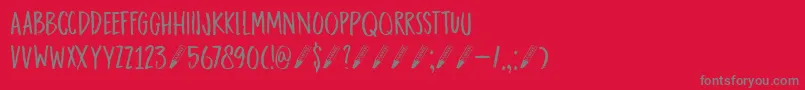 フォントDkDarkerMarker – 赤い背景に灰色の文字