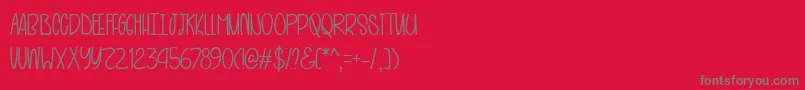 Saiba mais sobre a fonte HotAndBlackTeaTtf Fonte HotAndBlackTeaTtf – fontes cinzas em um fundo vermelho