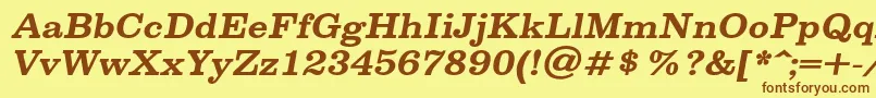 フォントSpslclarendoncBolditalic – 茶色の文字が黄色の背景にあります。