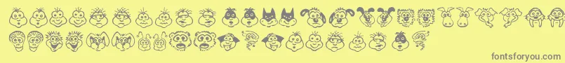 KimsToons Font – Gray Fonts on Yellow Background