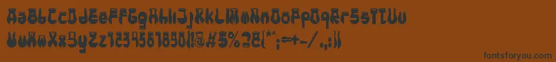 フォントCotocityBold – 黒い文字が茶色の背景にあります