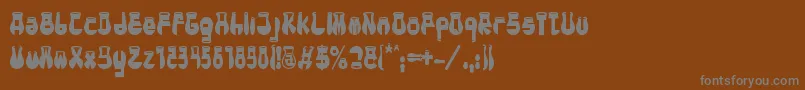 フォントCotocityBold – 茶色の背景に灰色の文字