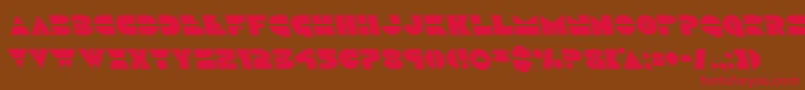 フォントDiscoduckleft – 赤い文字が茶色の背景にあります。