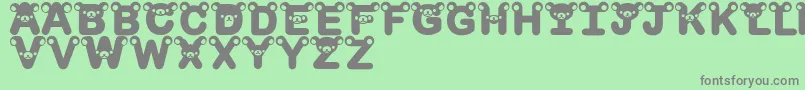 RilakkumadingbatBold Font – Gray Fonts on Green Background