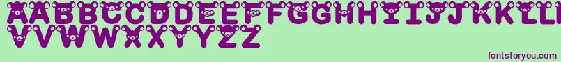 RilakkumadingbatBold Font – Purple Fonts on Green Background