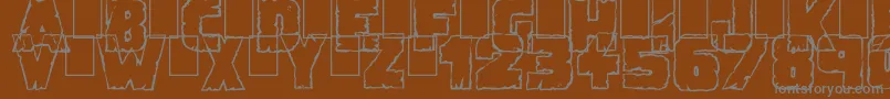 フォントDemolitionCrack – 茶色の背景に灰色の文字