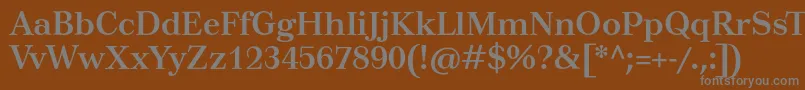 TusarBold-fontti – harmaat kirjasimet ruskealla taustalla