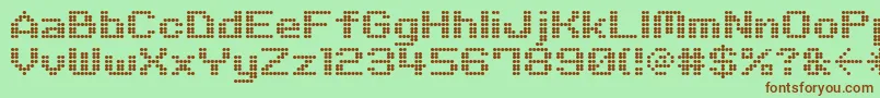 M06Quadra Font – Brown Fonts on Green Background