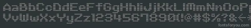 フォントM06Quadra – 黒い背景に灰色の文字