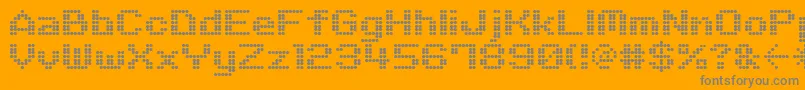 Czcionka M06Quadra – szare czcionki na pomarańczowym tle