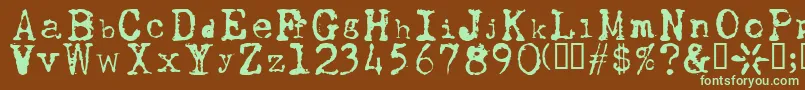 UwjackBeta-Schriftart – Grüne Schriften auf braunem Hintergrund