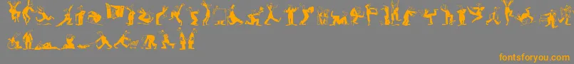 MaennekenLtBlack-Schriftart – Orangefarbene Schriften auf grauem Hintergrund