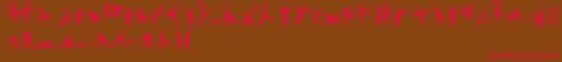 MaennekenLtBlack-Schriftart – Rote Schriften auf braunem Hintergrund