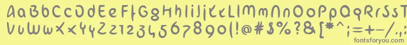 フォントArabstrokeLtHeavy – 黄色の背景に灰色の文字