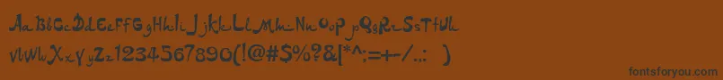 フォントDsarabicc – 黒い文字が茶色の背景にあります