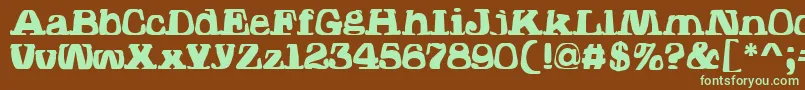 フォントHodadWarpedOne – 緑色の文字が茶色の背景にあります。