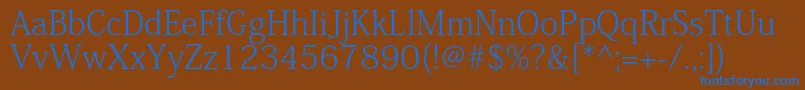KozminproExtralight Font – Blue Fonts on Brown Background