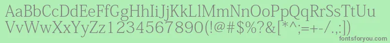 KozminproExtralight Font – Gray Fonts on Green Background