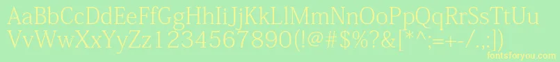 KozminproExtralight-fontti – keltaiset fontit vihreällä taustalla